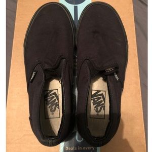 All black Vans slip on